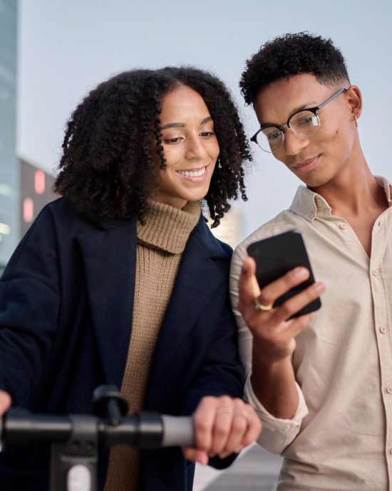 Couple, friends or students in city with phone travel for communication, networking or social media. Electric scooter, happy or black woman and man on smartphone for 5g network, contact us or app.